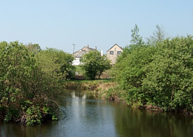 Barn and Stable Cottages from Island Lake