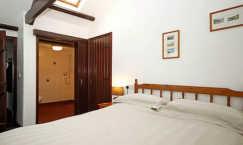 Comfortable double room with ensuite shower room with power shower.